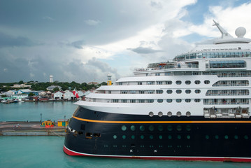 Cruise Ship Under Dark Clouds in Nassau