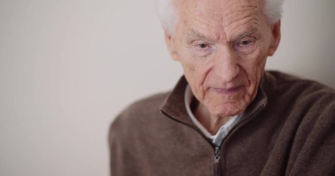 senior man has cold snot and sneezing