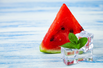 Pieces of watermelon, mint and ice