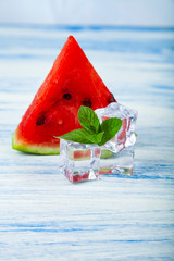 Pieces of watermelon, mint and ice