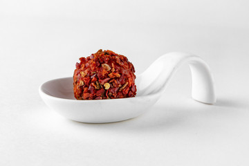 Serving appetizer is a curd cheese ball with delicious additives. Beautifully decorated catering...