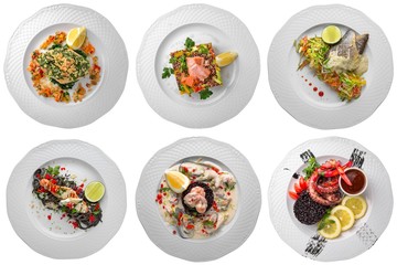 Seafood set with garnish. Rice, pasta, salad with shrimp, fish, octopus. Isolated on a white background.