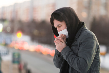 Side view of sick man coughing with copy space