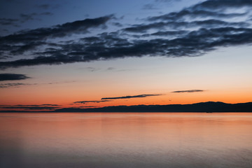 Fototapeta na wymiar Sunset in Lac Leman Lausanne Switzerland