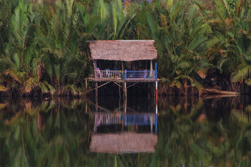 Wooden house boxe in the Cambodian jungle along the Preaek Tuek Chhuk River in Kampot.