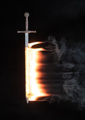burning fire sword on a black background