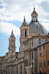 The dome of the cathedral in Rome, Italy. The cathedral and other houses on Piazza Navona.