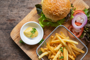 Hamburger with French fries Lettuce and Cheese
