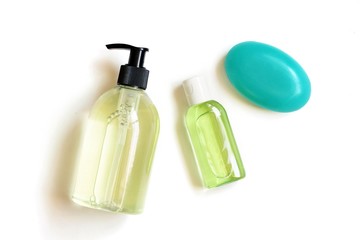 Hygiene concept, coronavirus prevention. Antibacterial liquid and soap bar, hydroalcoholic sanitizer gel for hands washing