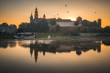 Fototapeta na wymiar Panorama of Cracow, Poland, with royal Wawel castle, cathedral.