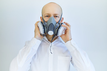 image of business man wearing protective mask against virus and pollution