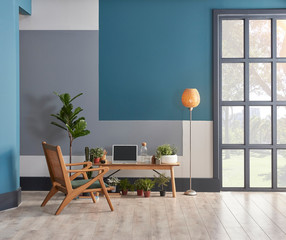Decorative living room blue grey and white wall concept with black window. Wooden chair and furniture decor. lamp clock and carpet design.
