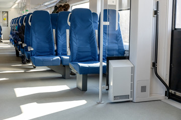 Fototapeta na wymiar armchairs in a modern train car