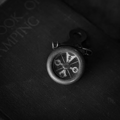 black and white old compass