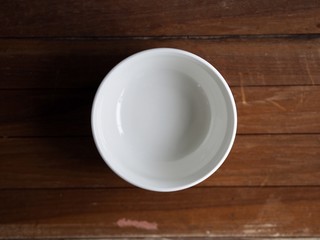 empty cup on wooden table
