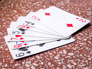 Closeup view of many playing cards forming the poker