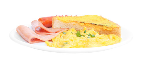 Side of breakfast near scrambled egg sausage toast bread dish.
