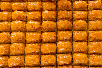 Traditional Turkish dessert baklava background,top view,flat layout