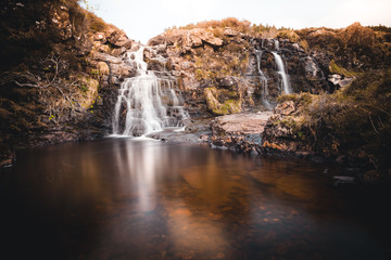 Beautiful waterfalls scenery on the Isle of Skye, Scotland: The Fairy Pools, Glen Brittle, Scotland