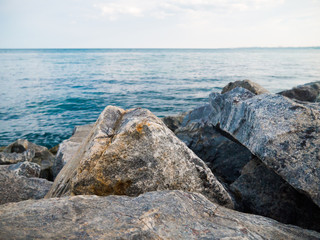 Fototapeta na wymiar Large boulders on the background of the sea