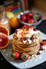 pankake breakfast with yogurt honey and strawberries