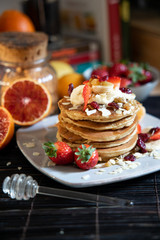 pankake breakfast with yogurt honey and strawberries