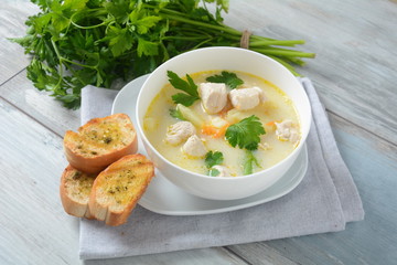 Creamy soup with chicken and vegetables 