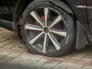Fototapeta na wymiar Car tires exploded