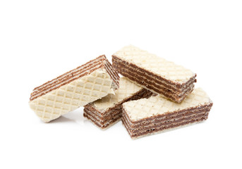 Crispy wafers with creamy hazelnut filling isolated on white background