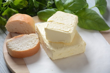 Butter. Slice of butter with basil