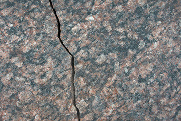 Closeup of grey granite texture background.