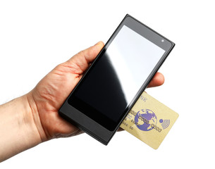 Male hands holding wireless pos terminal and banking card isolated on white background
