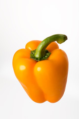 Orange bell pepper on white background