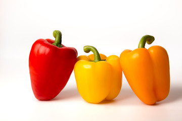 three peppers isolated on white background