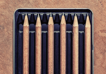 Concept picture for social distancing. Pens in a box.