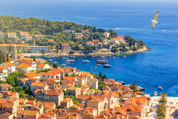 Fototapeta na wymiar Coastal summer landscape - view of the City Harbour of the town of Hvar, on the island of Hvar, the Adriatic coast of Croatia