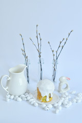 Festive Easter spring composition with pussy willow branches with catkins and multicolored eggs.Easter Background. Springtime. Invitation card design with copy space. Easter card template.