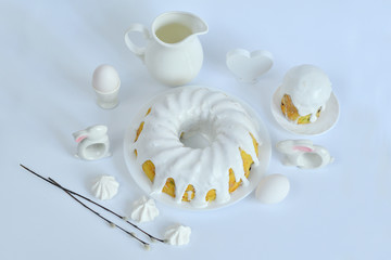 Festive Easter spring composition with pussy willow branches with catkins and multicolored eggs.Easter Background. Springtime. Invitation card design with copy space. Easter card template.