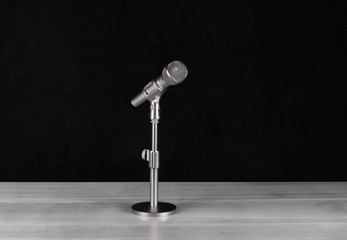 silver microphone isolated on black background