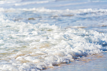 Sea surf on a sandy beach Canary Islands
