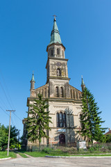 Fototapeta na wymiar Ecka, Serbia - June 30, 2019: St. Jovan the Baptist Catholic Church in Ečka, Serbia. It was erected in 1864 on the site of the old church from 1794.
