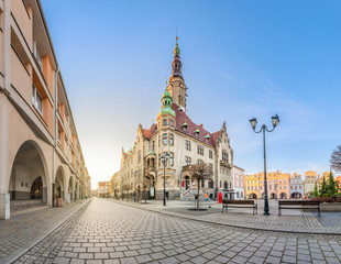 Naklejka na ściany i meble Jawor, Poland. View of Rynek square with historic building of Town Hall on sunrise