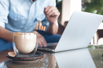 Man working on laptop computer from home