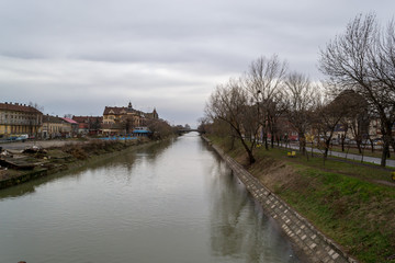 Fototapeta na wymiar A view of the Bega river from a bridge