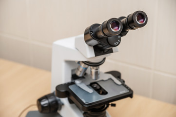 Fototapeta na wymiar Laboratory research using a microscope in a clinic