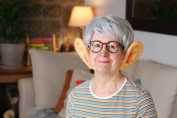 Senior woman with large ears