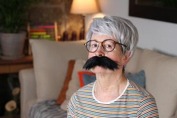 Senior woman with a mustache