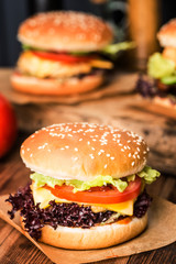 fresh chicken burger on wooden table