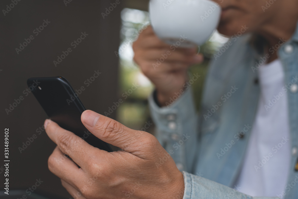 Poster man using mobile smart phone