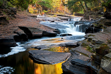 The Presque Isle River winds through a landscape of autumn color in the Porcupine Mountains Wilderness State Park in Michigan's Upper Peninsula.